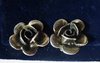Silver rose ear clips