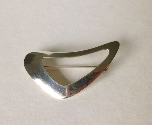 N.E.From Sterling silver aerodynamic brooch